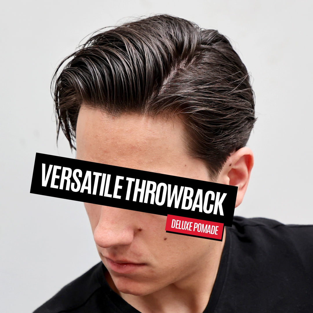 A man wearing a dark brown pomade with a glossy finish, styled in a side-parted, swept-back look. A black banner overlay across his eyes reads 'VERSATILE THROWBACK' and a small red badge below reads 'DELUXE POMADE'.