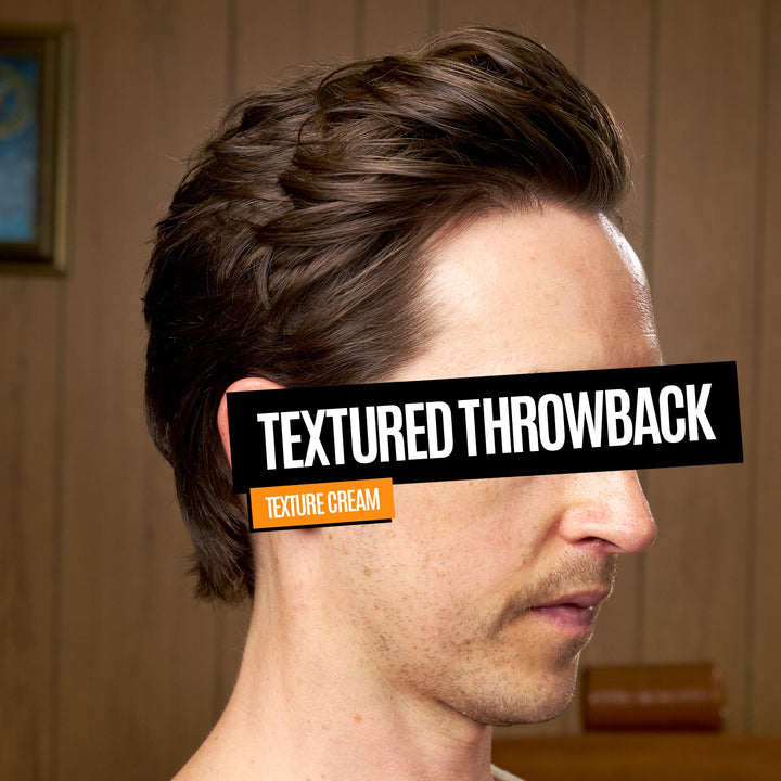 A man in profile with styled brown hair and a black text banner across his eyes reading 'TEXTURED THROWBACK' and 'TEXTURE CREAM'. The background is a warm wood-paneled room.