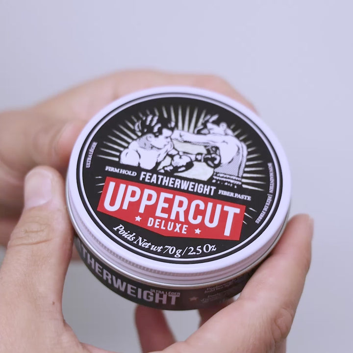 Uppercut Deluxe Featherweight tin being opened, scooped and spread through hands.